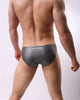 Slip hombre de piel efecto mojado con bolsa frontal